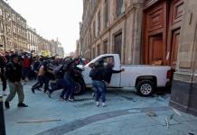 AMLO descarta procesar a manifestantes tras incursión al Palacio Nacional