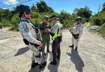 Pugna de carteles causa bloqueos carreteros y suspensión de clases en Michoacán