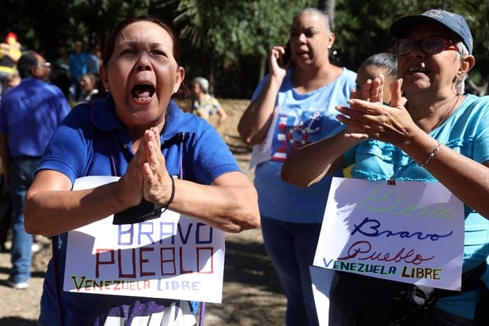 Oposición de Venezuela marcha contra la investidura de Maduro con Machado al frente