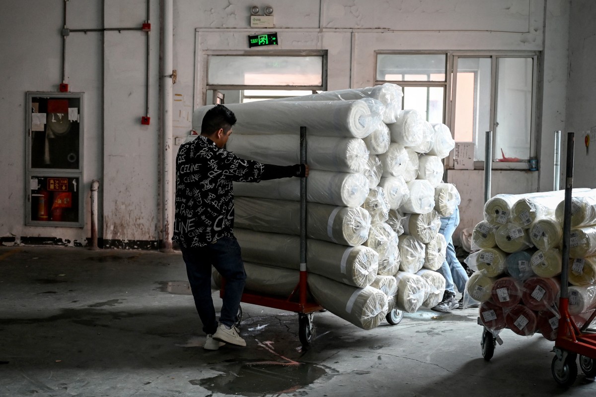 Los exportadores chinos de textiles esperan con ansiedad una reconciliación comercial con EEUU Los exportadores chinos de textiles esperan con ansiedad una reconciliación comercial con EEUU