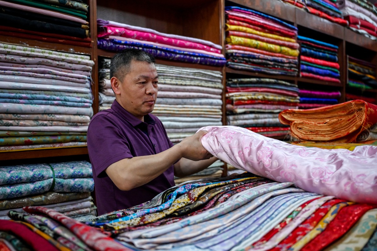 Los exportadores chinos de textiles esperan con ansiedad una reconciliación comercial con EEUU Los exportadores chinos de textiles esperan con ansiedad una reconciliación comercial con EEUU