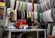 Los exportadores chinos de textiles esperan con ansiedad una reconciliación comercial con EEUU