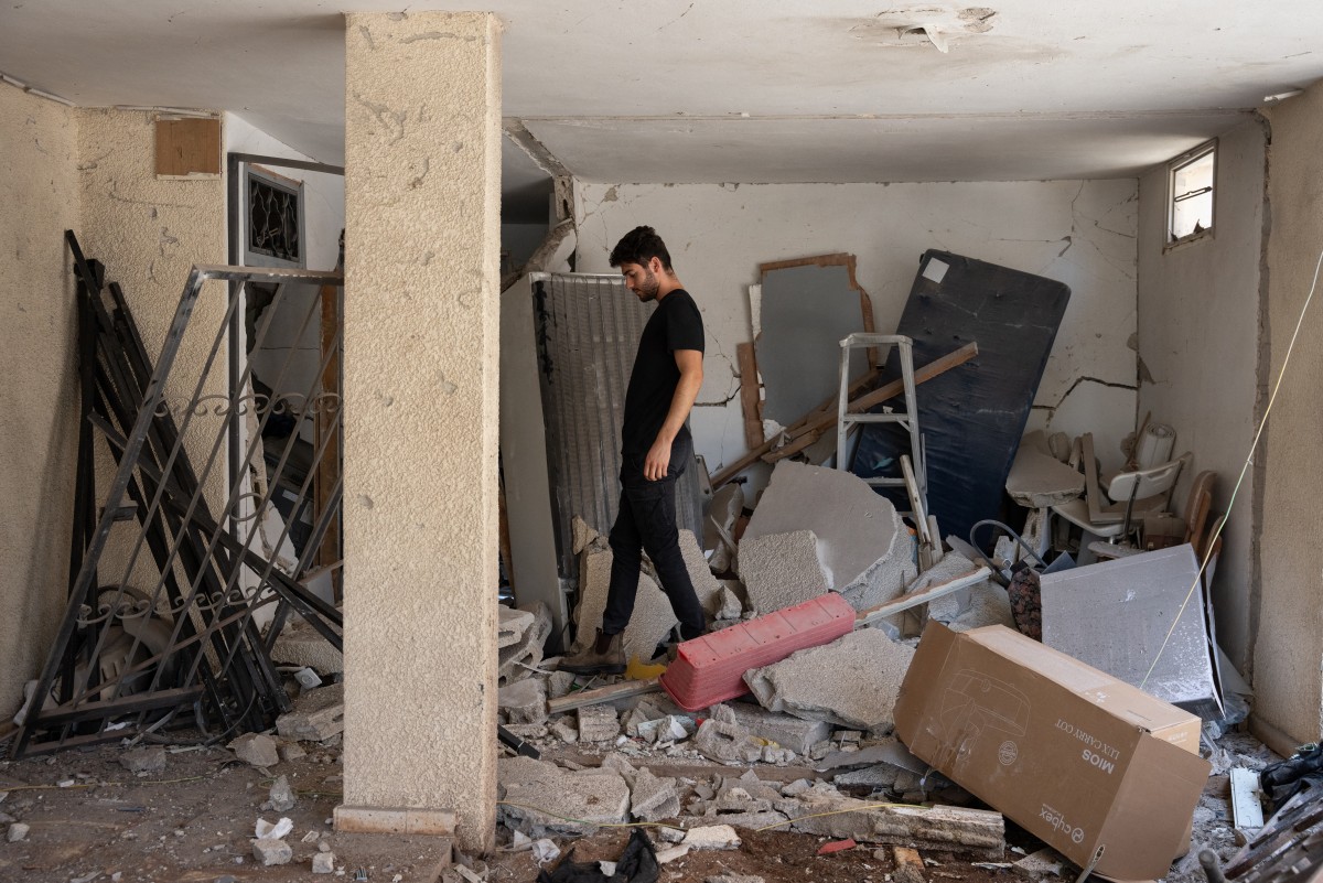 En Teherán, entre el miedo y la resiliencia bajo los bombardeos israelíes En Teherán, entre el miedo y la resiliencia bajo los bombardeos israelíes