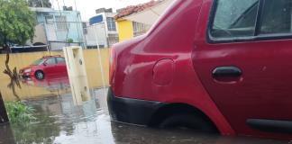 Lluvias inundan fraccionamiento de Tlajomulco; vecinos culpan obras de L4