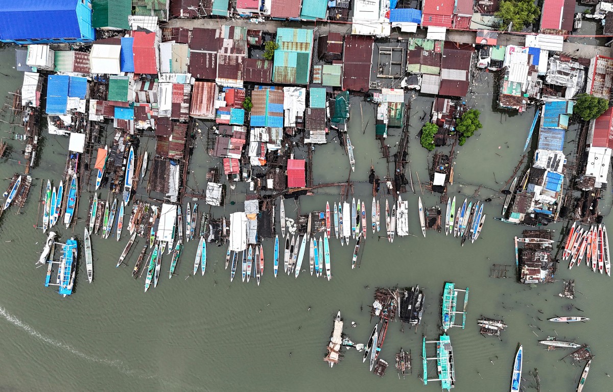 A contracorriente, filipinos luchan contra el aumento del nivel del mar en una isla en vías de desaparición A contracorriente, filipinos luchan contra el aumento del nivel del mar en una isla en vías de desaparición