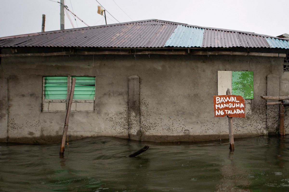 A contracorriente, filipinos luchan contra el aumento del nivel del mar en una isla en vías de desaparición A contracorriente, filipinos luchan contra el aumento del nivel del mar en una isla en vías de desaparición