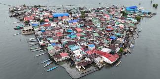 A contracorriente, filipinos luchan contra el aumento del nivel del mar en una isla en vías de desaparición