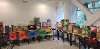 "Ayudantes de Santa" llevan regalos a ni&ntilde;as y ni&ntilde;os de MAMA AC