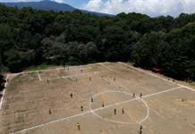 La cancha de fútbol que resiste dentro de un antiguo volcán en el sur de Ciudad de México La cancha de fútbol que resiste dentro de un antiguo volcán en el sur de Ciudad de México