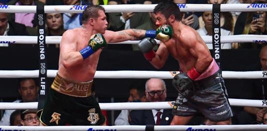 Canelo retiene títulos mundiales pero no logra noquear a Ryder ante su gente